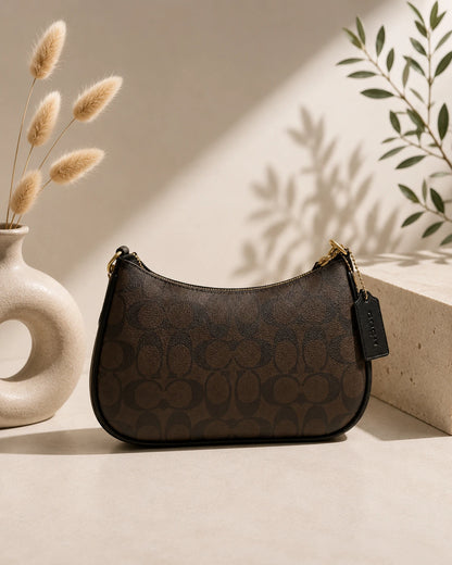 Coach Signature Monogram Canvas Swinger