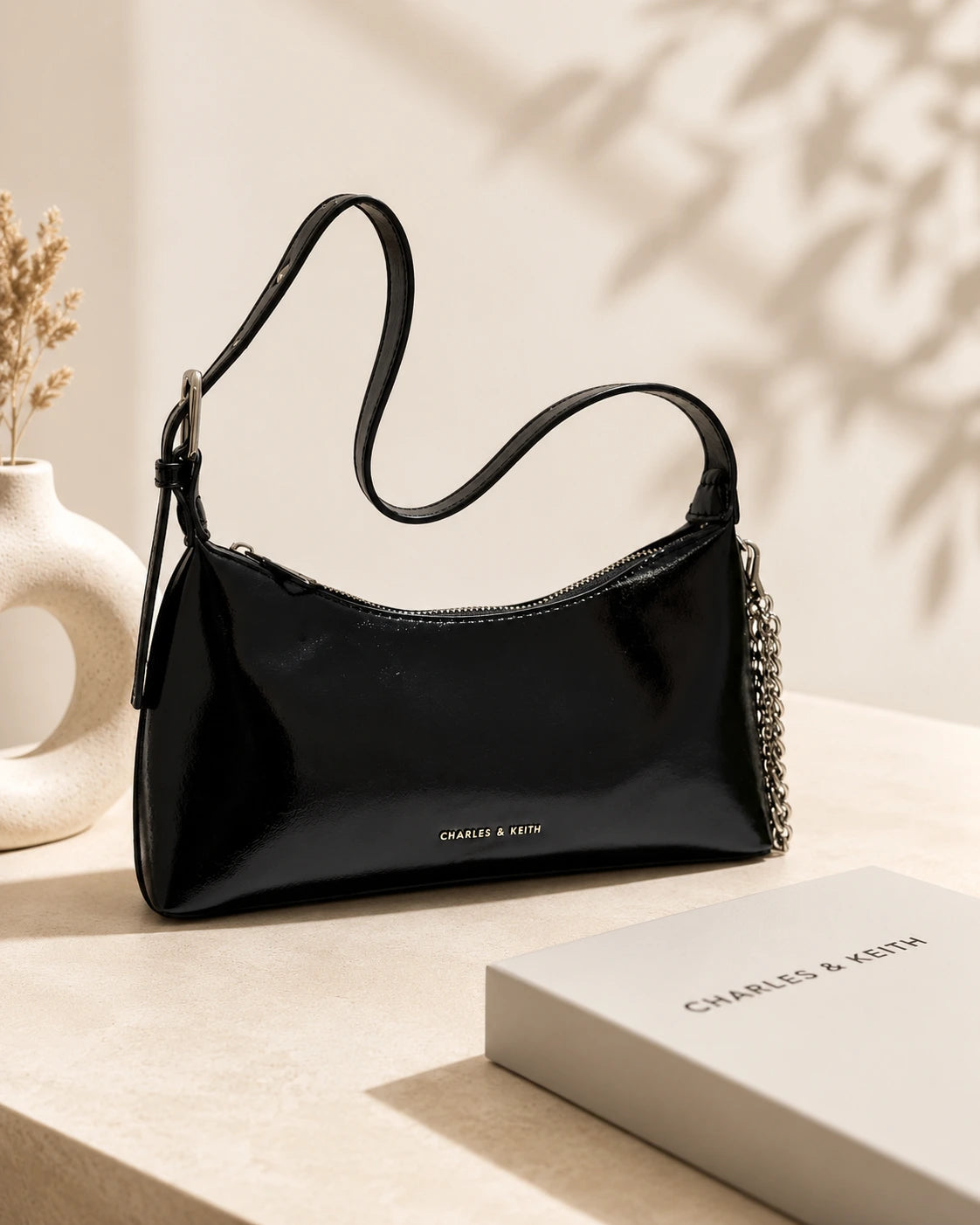 Charles & Keith Patent Curved Shoulder Bag