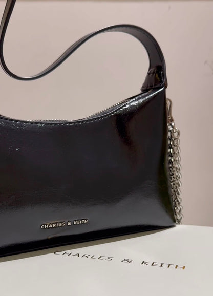 Charles & Keith Patent Curved Shoulder Bag